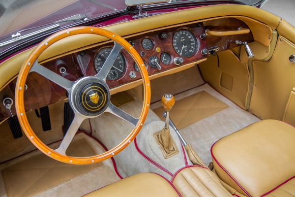 For Sale Used 1957 Jaguar XK140 Burgundy Roadster 4-speed | American Dream Machines Des Moines IA 50309