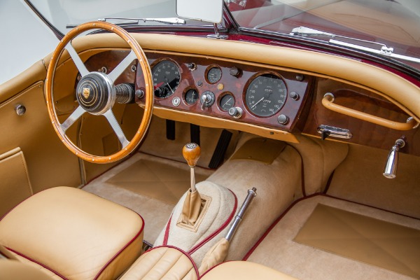 For Sale Used 1957 Jaguar XK140 Burgundy Roadster 4-speed | American Dream Machines Des Moines IA 50309