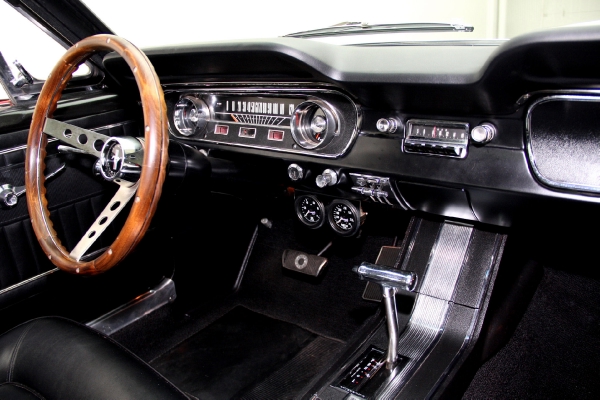 For Sale Used 1965 Ford Mustang Fastback poppy red, blk interior | American Dream Machines Des Moines IA 50309