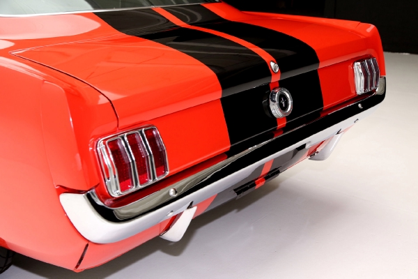 For Sale Used 1965 Ford Mustang Fastback poppy red, blk interior | American Dream Machines Des Moines IA 50309