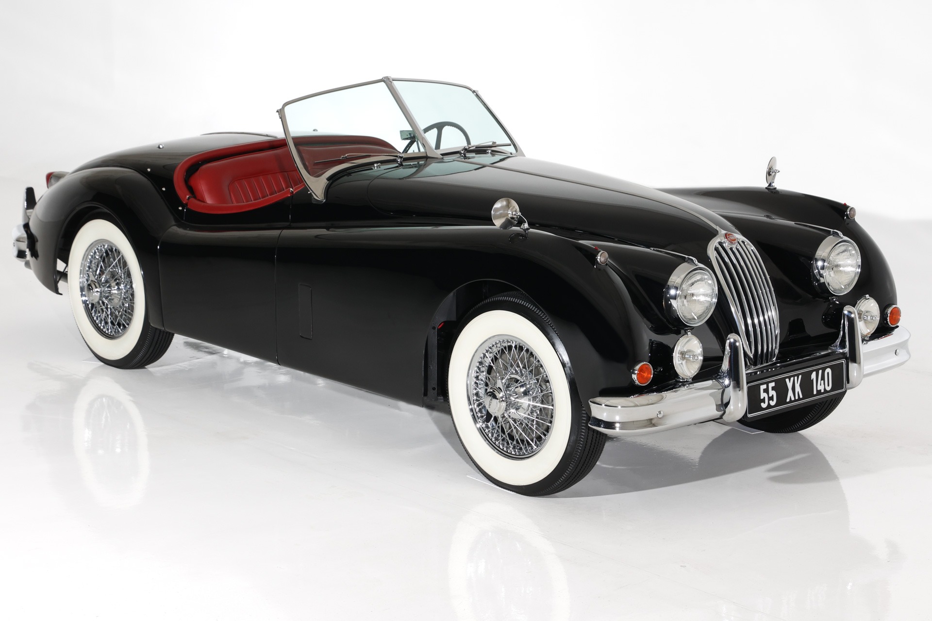 For Sale Used 1955 Jaguar XK140 SE Exquisite Black, Red Leather | American Dream Machines Des Moines IA 50309