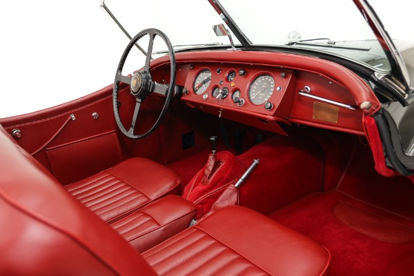 For Sale Used 1955 Jaguar XK140 SE Exquisite Black, Red Leather | American Dream Machines Des Moines IA 50309