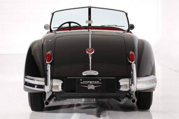 For Sale Used 1955 Jaguar XK140 MC Exquisite Black, Red Leather | American Dream Machines Des Moines IA 50309