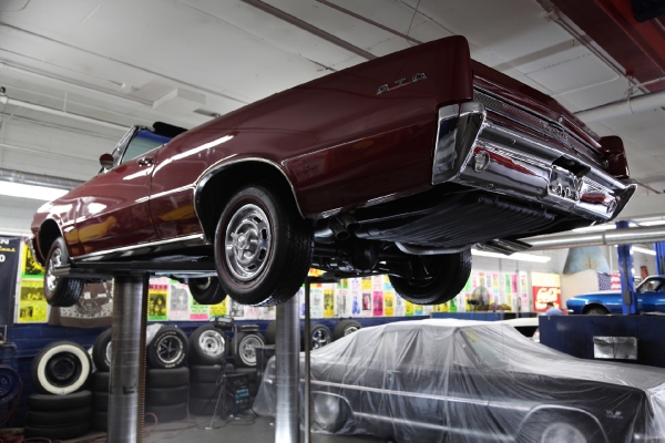 For Sale Used 1964 Pontiac GTO Convertible Red/Blk PHS 4spd 389 3 deuces | American Dream Machines Des Moines IA 50309