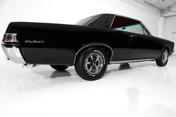 For Sale Used 1965 Pontiac GTO Black/Red 389/335 4-Speed PHS | American Dream Machines Des Moines IA 50309